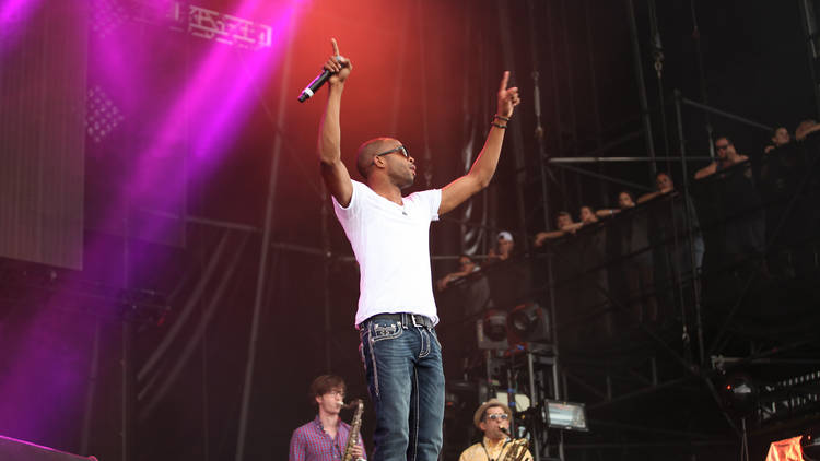 Trombone Shorty hits the stage in Grant Park to play a sold-out Lollapalooza Music Festival 2014.