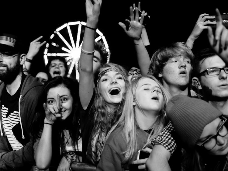 Attendees enjoy a punk rock carnival during the final day of Riot Fest Chicago on September 14, 2014.