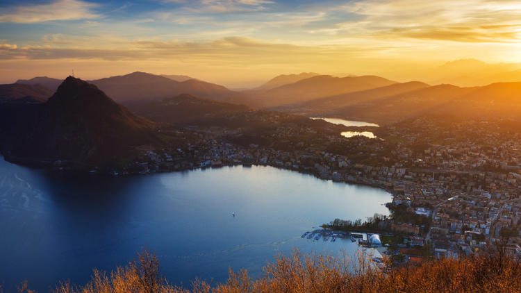 See Lugano from up high at Monte Brè