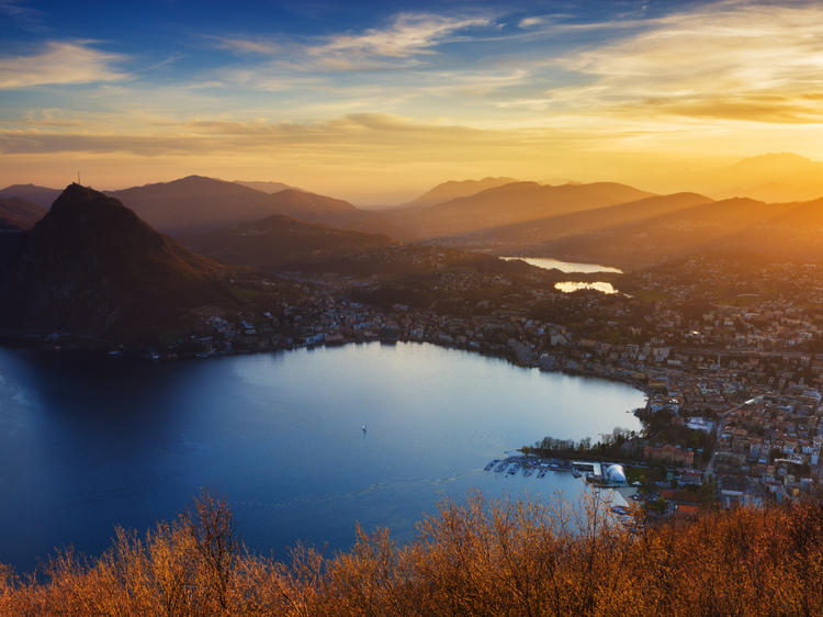 See Lugano from up high at Monte Brè