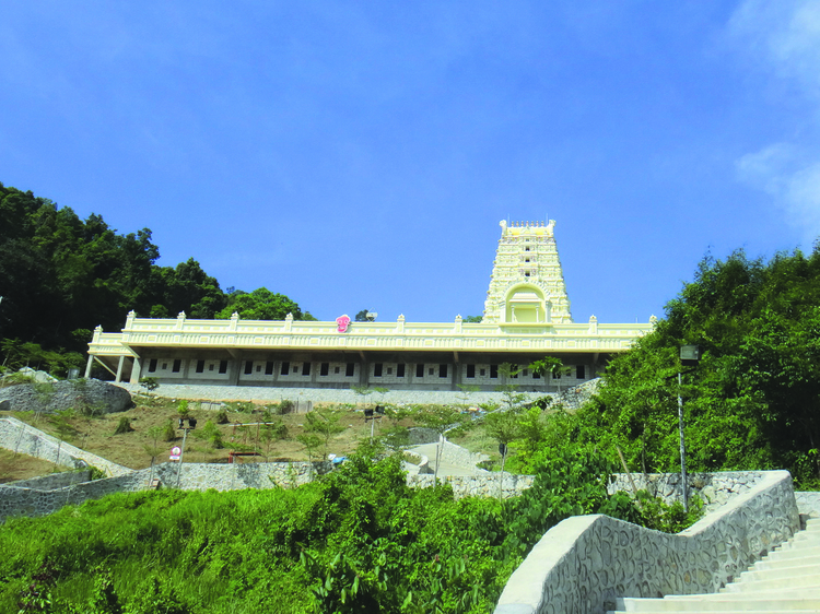 Climb the 500 steps to Waterfall Hilltop Temple