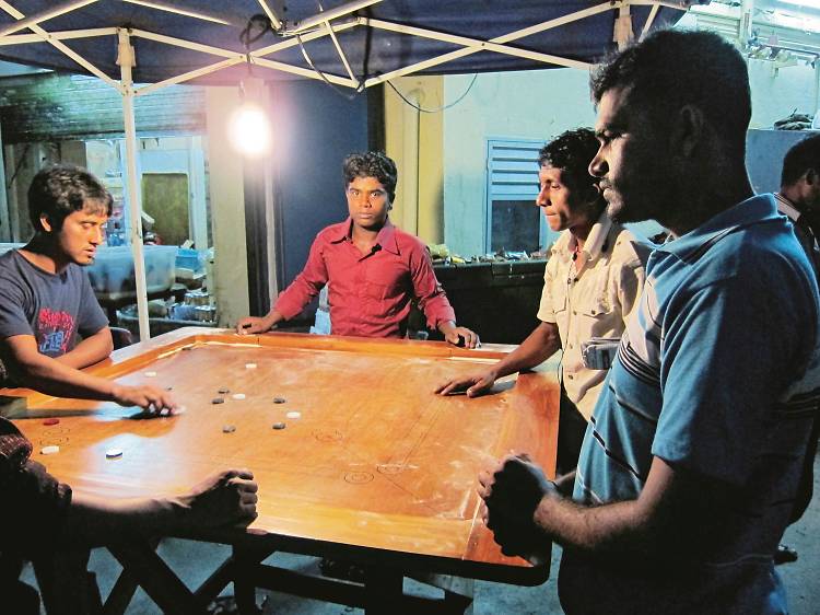 Watch a late-night carom match