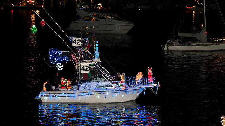 Watch lit-up boats sail by during the Marina Del Rey Boat Parade