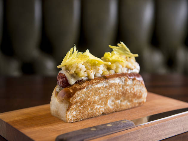 Bacon-wrapped hot dog at the NoMad Bar Bacon-wrapped hot dog at the NoMad Bar