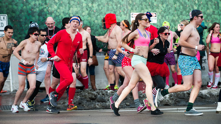 Runners streaked through Wrigleyville in their undergarments during Cupid's Undie Run, February 7, 2015.
