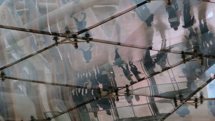 Shoppers reflected in the Bullring ceiling