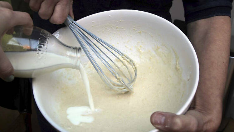 5. Gradually whisk in the milk