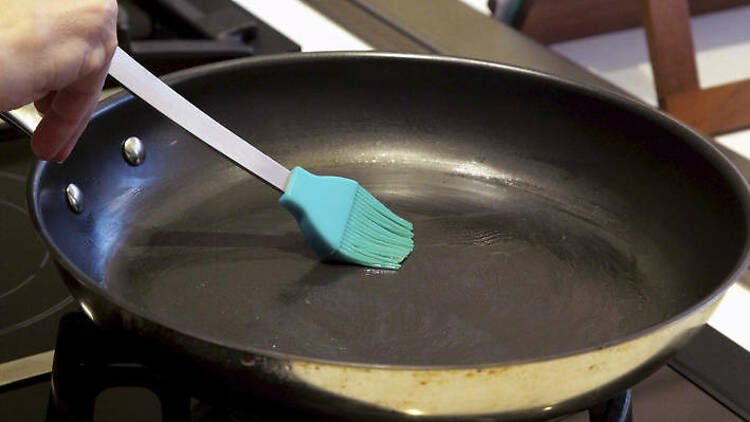 7. Grease the pan (repeat for each pancake)