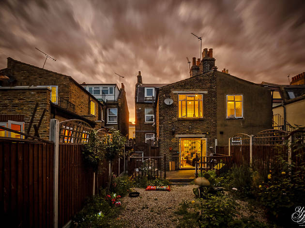 A home in Forest Gate. Storm clouds gather over a house in east London.