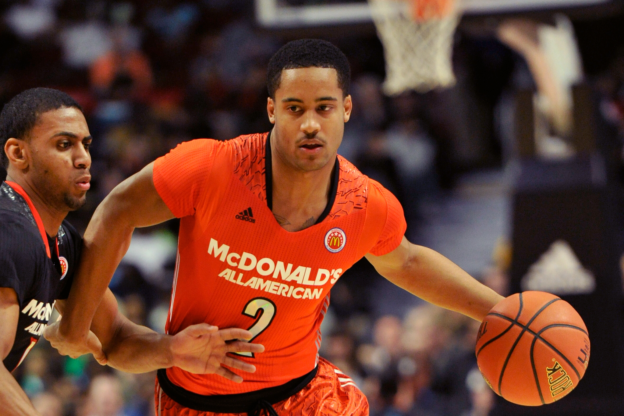 Ronald Mcdonald Basketball A Fan Dunks Over Ronald McDonald During