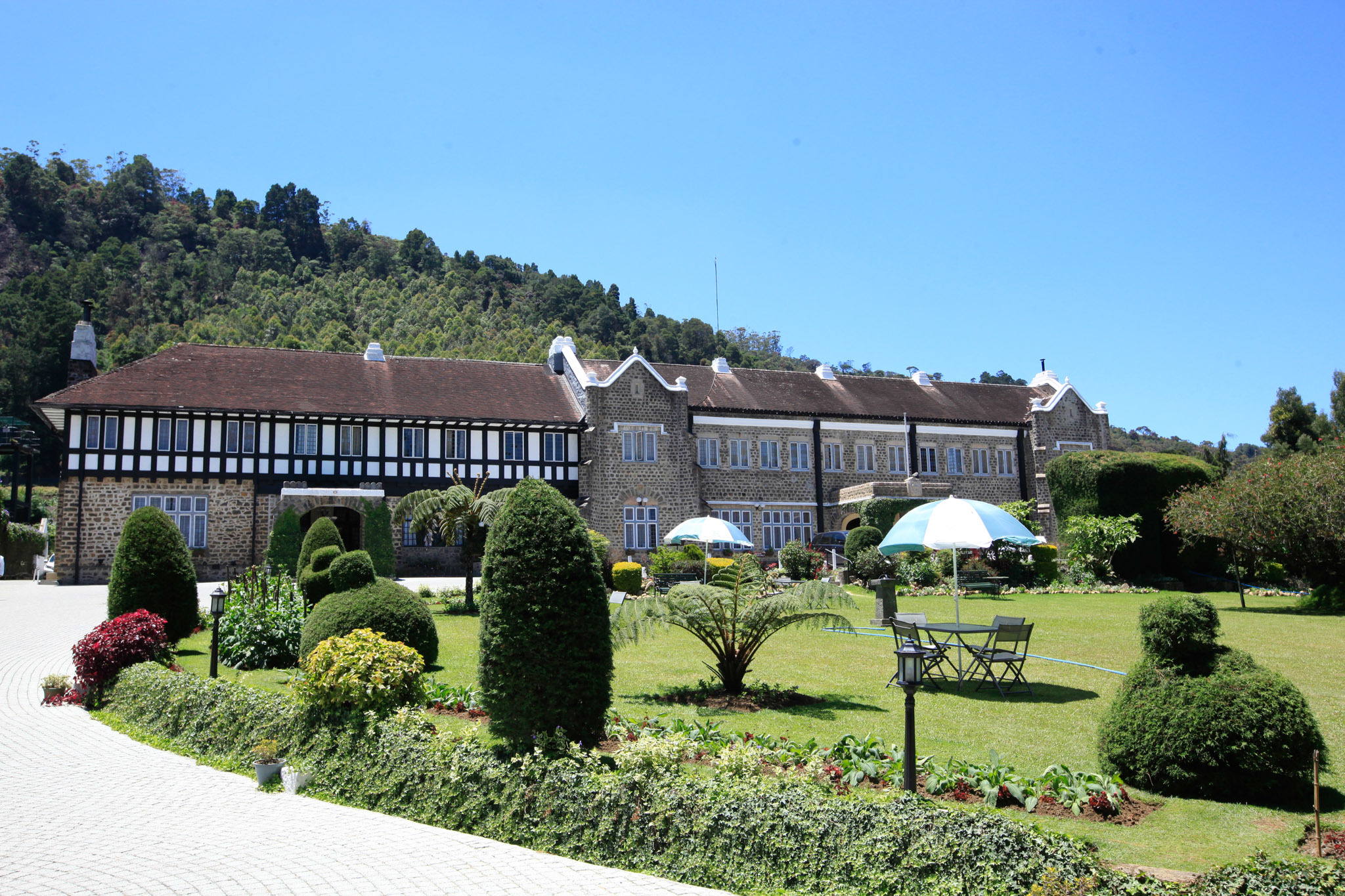 Nuwara Eliya colonial architecture Hill Club Grand Hotel 1891 pink post office market Little England Sri Lanka
