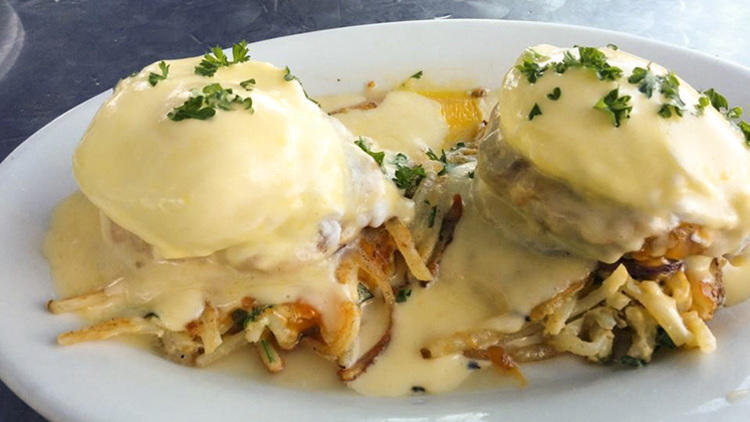 Rotating eggs Benedict list at Nick's Café