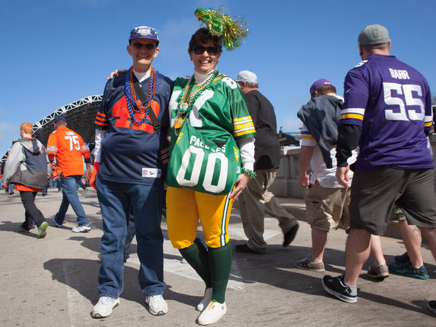 Football fans show off their team spirit in Grant Park at NFL Draft Town, April 30, 2015.