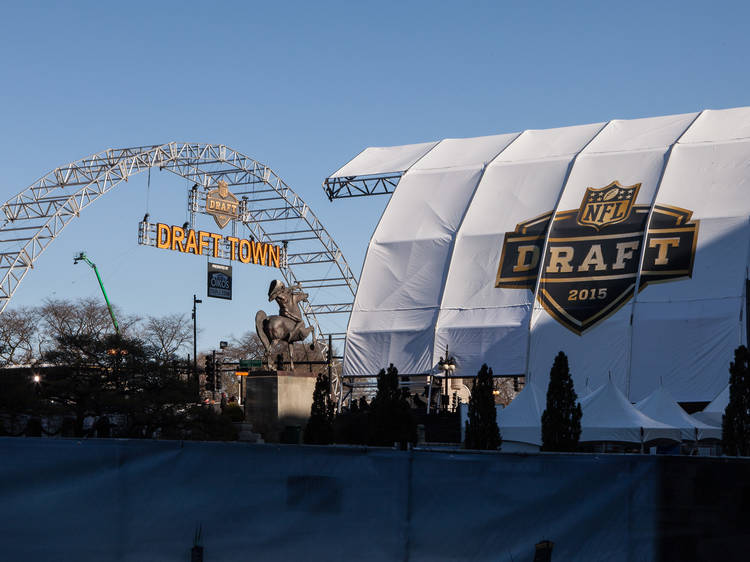 Football fans show off their team spirit in Grant Park at NFL Draft Town, April 30, 2015.