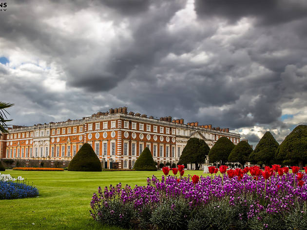 Dark clouds above flower beds at Hampton Court Palace Dark clouds above flower beds at Hampton Court Palace