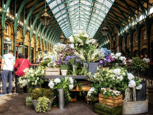 A Covent Garden flower stall. A Covent Garden flower stall.