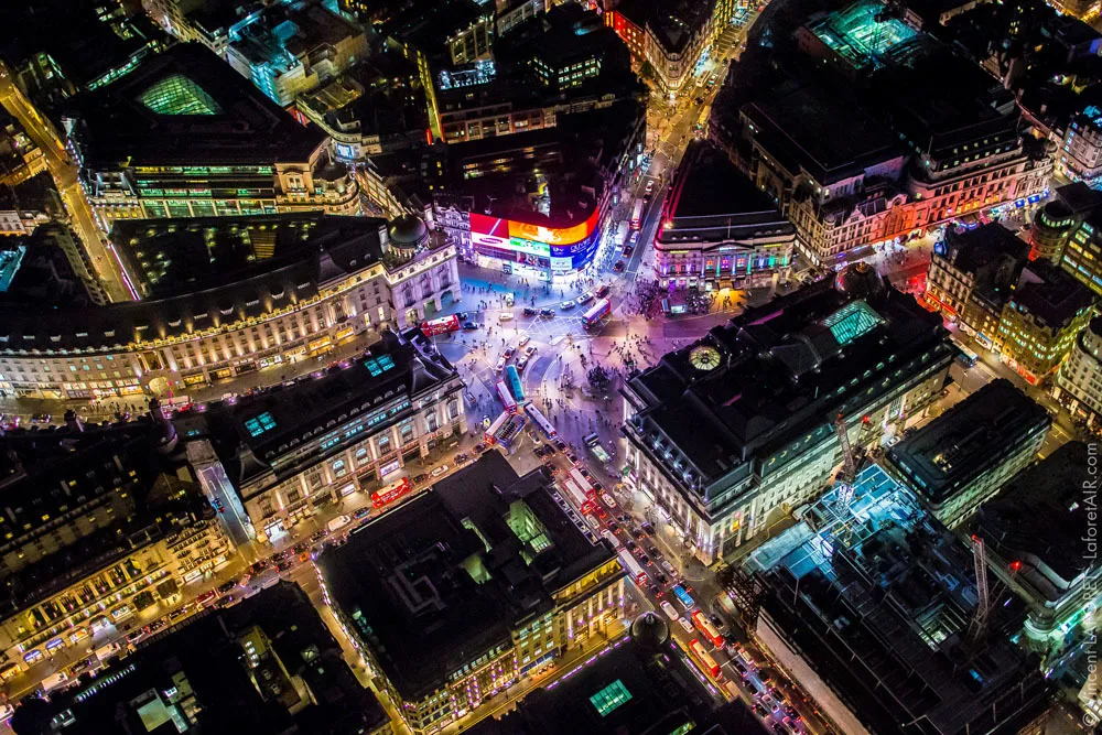 Piccadilly Circus from above at night. Photo by Vincent LaForet, AIR