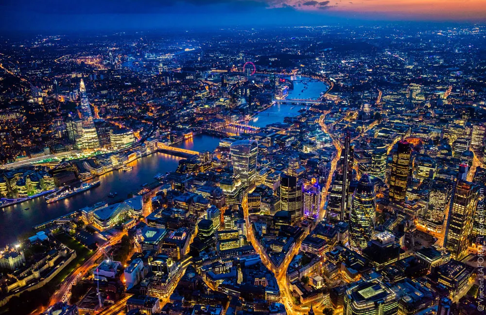 The streets of London at night, viewed from a helicopter. Photo by Vincent LaForet.