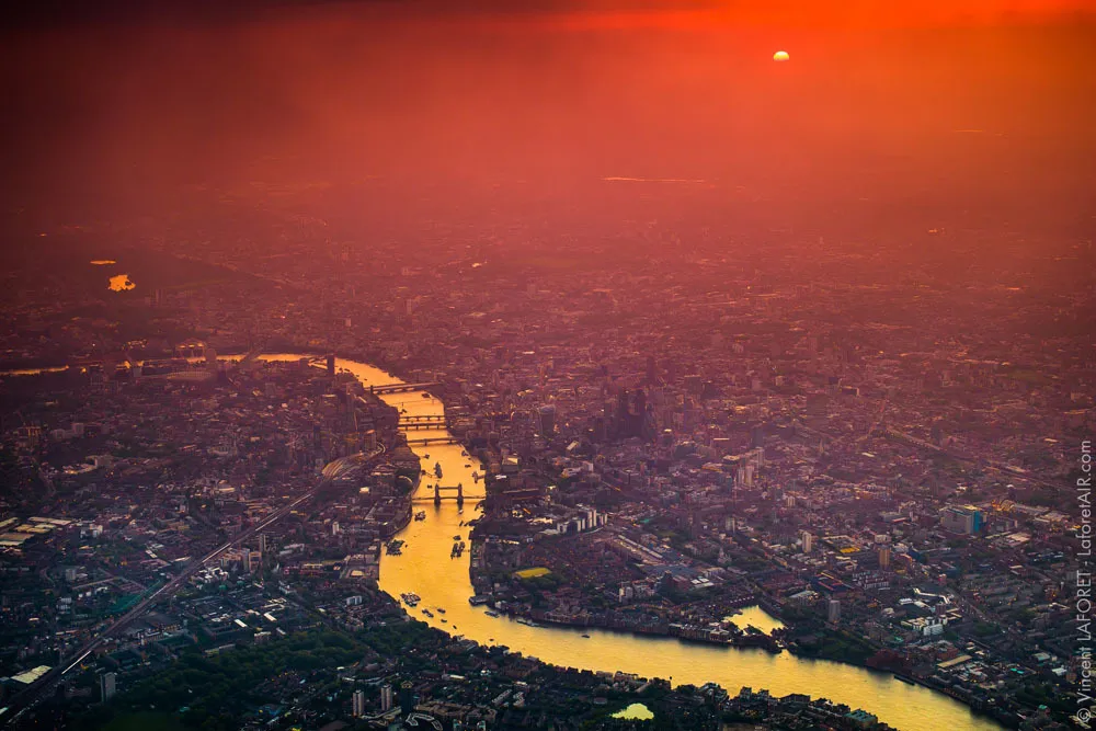 The Thames through London at sunset. Aerial photography by Vincent LaForet.