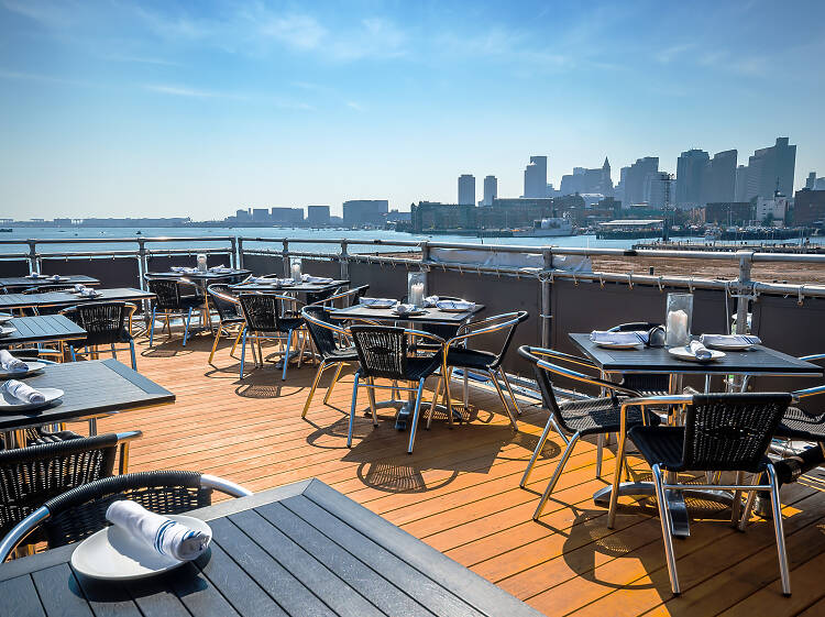 Enjoy your meal alfresco at a waterfront restaurant