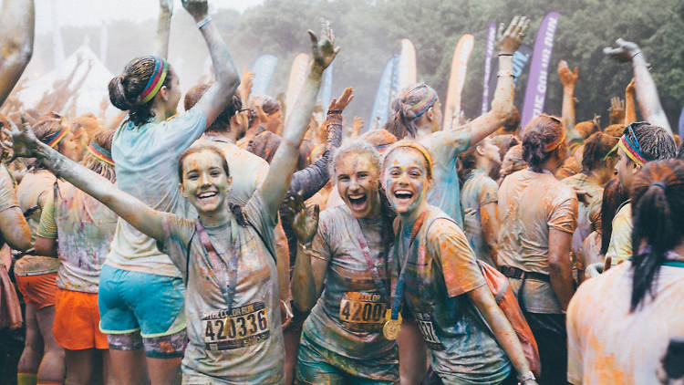 Runners get blasted with rainbow cornstarch at the Color Run 5K through Grant Park on June 7, 2015.