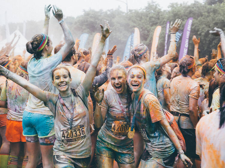 Runners get blasted with rainbow cornstarch at the Color Run 5K through Grant Park on June 7, 2015.