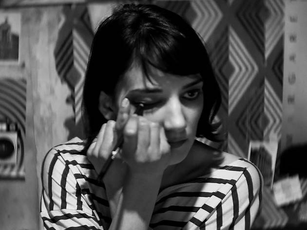 A girls walks home alone at night A girls walks home alone at night