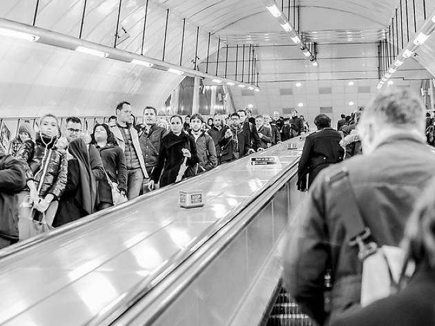 A busy escalator on the Tube.