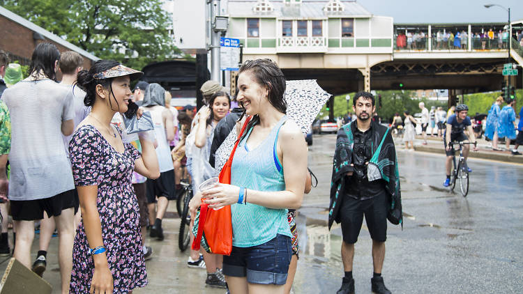 Attendees gathered outside of Union Park during the Pitchfork Music Festival evacuation.