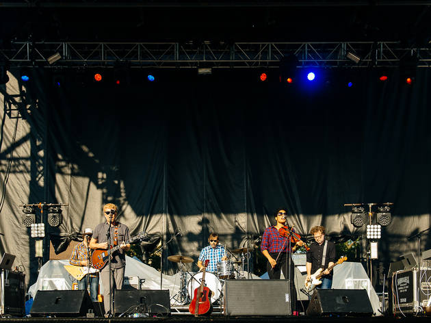 The New Pornographers played to an enthusiastic crowd during an unexpectedly stormy Saturday at Pitchfork Music Festival, July 18, 2015.