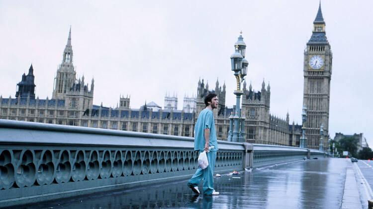 A still from 28 Days Later… of Cillian Murphy crossing Westminster bridge