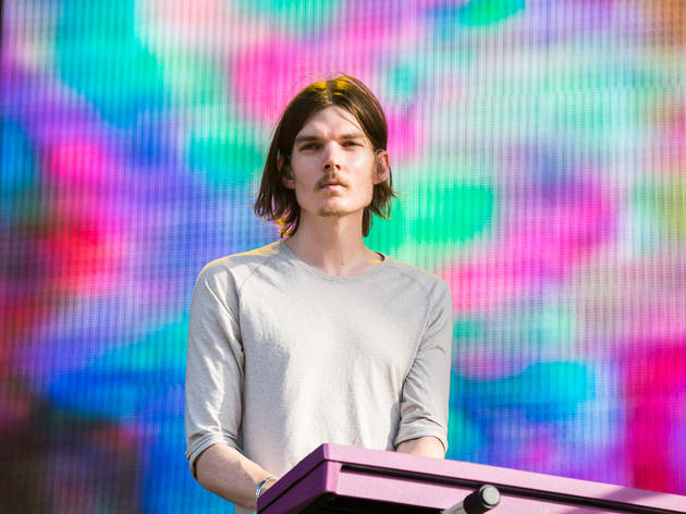 Tame Impala turned in a set in front of a crowd of thousands at Lollapalooza on August 1, 2015.