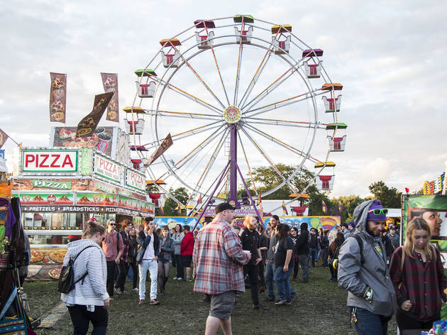 Soggy weather didn't dissuade attendees from showing up to the first day of Riot Fest, September 11, 2015.