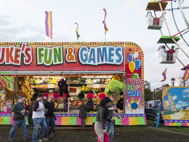 Soggy weather didn't dissuade attendees from showing up to the first day of Riot Fest, September 11, 2015.