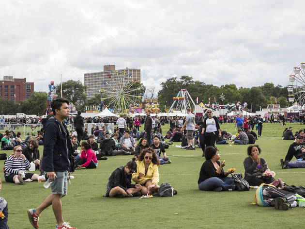 Soggy weather didn't dissuade attendees from showing up to the first day of Riot Fest, September 11, 2015.