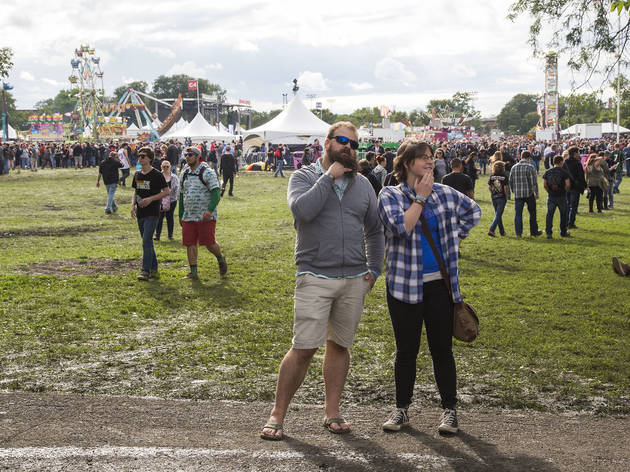 Soggy weather didn't dissuade attendees from showing up to the first day of Riot Fest, September 11, 2015.