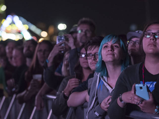 Soggy weather didn't dissuade attendees from showing up to the first day of Riot Fest, September 11, 2015.