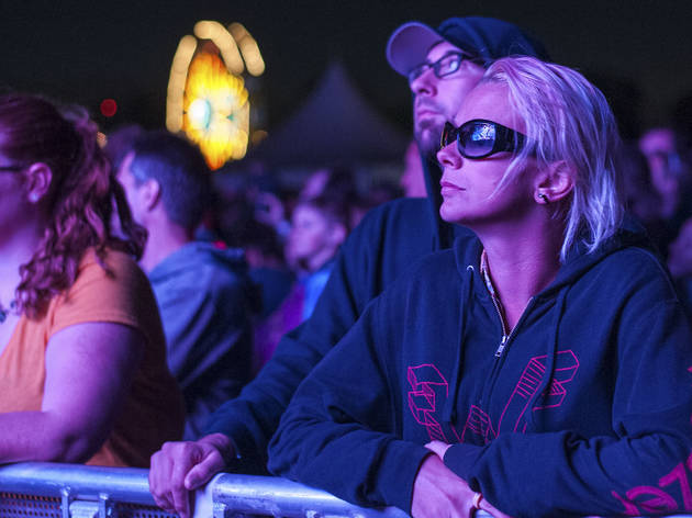 Soggy weather didn't dissuade attendees from showing up to the first day of Riot Fest, September 11, 2015.