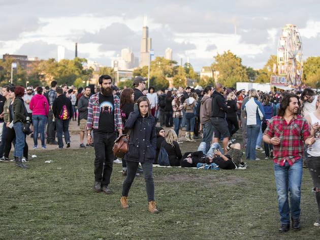 Soggy weather didn't dissuade attendees from showing up to the first day of Riot Fest, September 11, 2015.