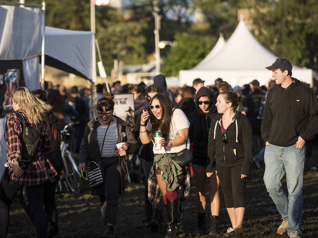Soggy weather didn't dissuade attendees from showing up to the first day of Riot Fest, September 11, 2015.