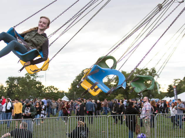 Soggy weather didn't dissuade attendees from showing up to the first day of Riot Fest, September 11, 2015.