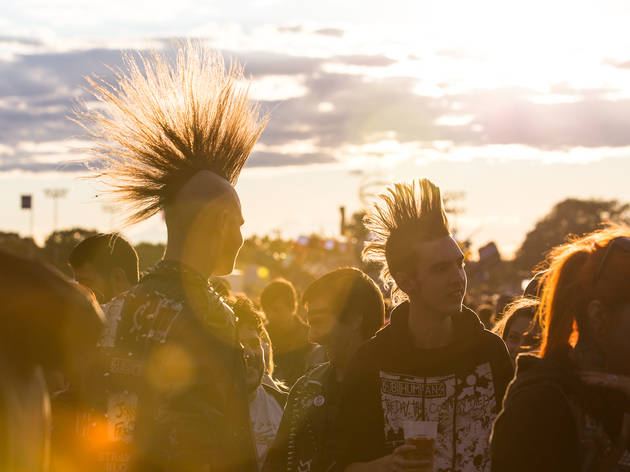 Soggy weather didn't dissuade attendees from showing up to the first day of Riot Fest, September 11, 2015.