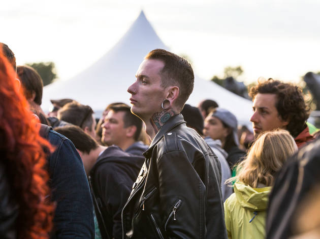 Soggy weather didn't dissuade attendees from showing up to the first day of Riot Fest, September 11, 2015.