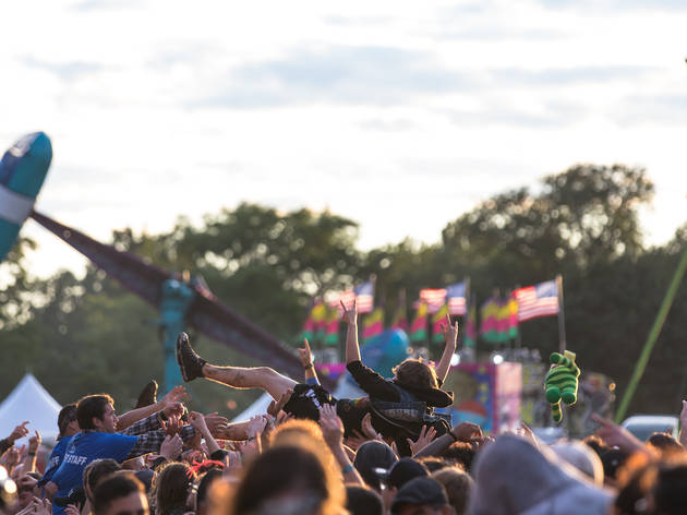Soggy weather didn't dissuade attendees from showing up to the first day of Riot Fest, September 11, 2015.