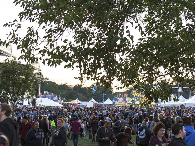 Soggy weather didn't dissuade attendees from showing up to the first day of Riot Fest, September 11, 2015.