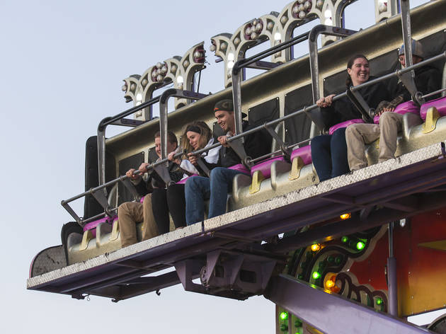 Crowds trudged through muddy fields during the second day of Riot Fest, September 12, 2015.
