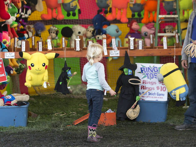 Crowds trudged through muddy fields during the second day of Riot Fest, September 12, 2015.