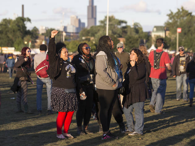 Crowds trudged through muddy fields during the second day of Riot Fest, September 12, 2015.