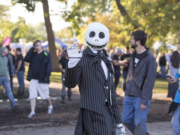 Crowds trudged through muddy fields during the second day of Riot Fest, September 12, 2015.