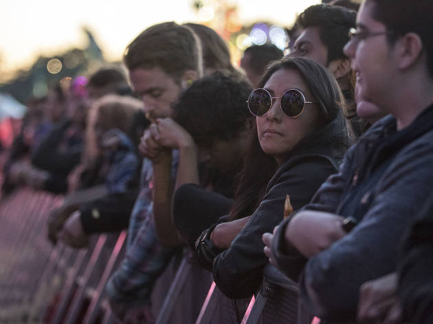 Crowds trudged through muddy fields during the second day of Riot Fest, September 12, 2015.